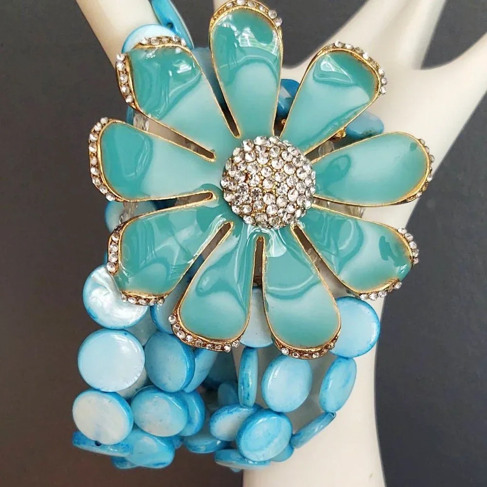 Dyed shell stretch bracelet w/enamel flower& cz's